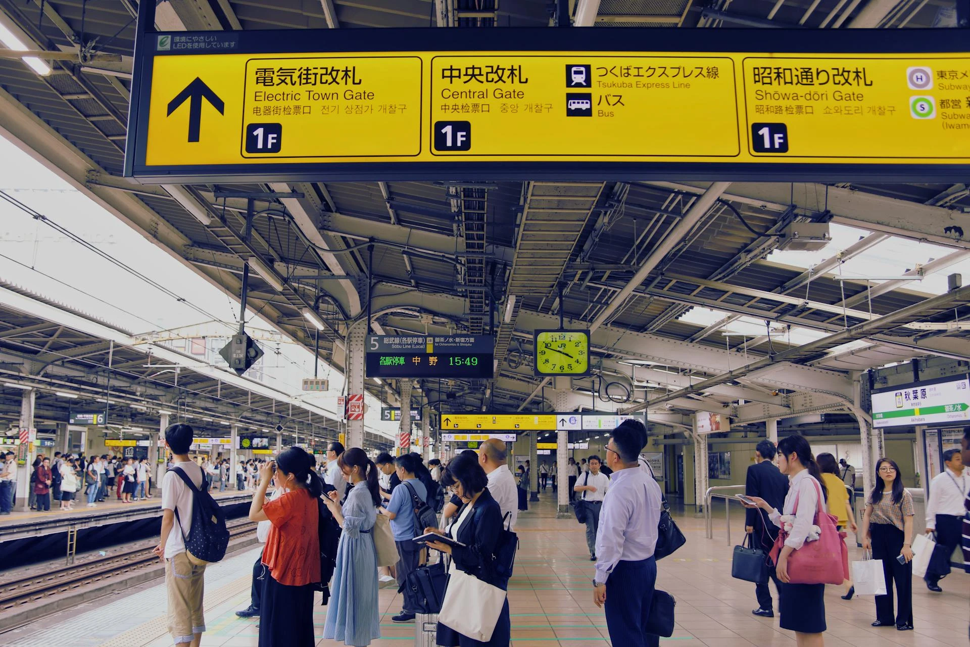 Commuters walking through a Tokyo train station